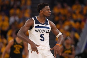 Timberwolves guard Anthony Edwards reacts after hitting a three-pointer against the Golden State Warriors in the third quarter of Game 4 on Monday.